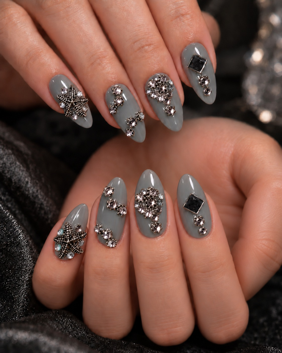 Silver Raas Grey Navratri press-on nails worn on hand