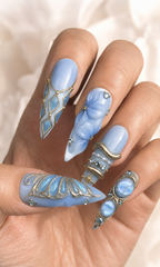 Azure Papillon press-on nails on hand