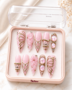 Blush Papillon press-on set, flat lay