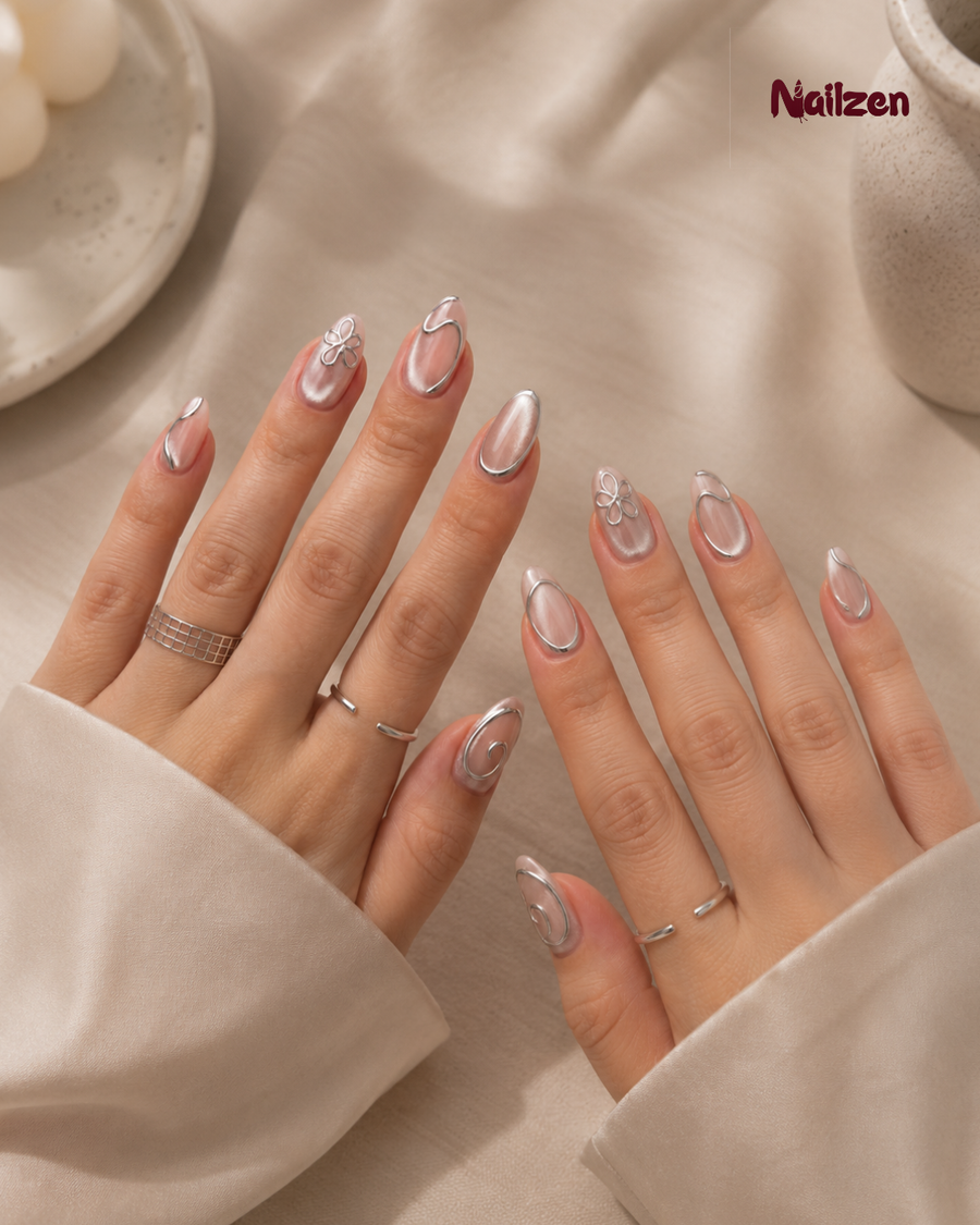 Chrome Swirl French press-on nails - silver chrome swirl nail art on nude base