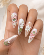 Serpent Lily press-on nails on hand